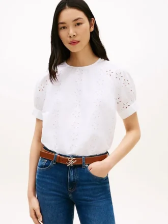 Blusa con mangas abullonadas y ojales bordados