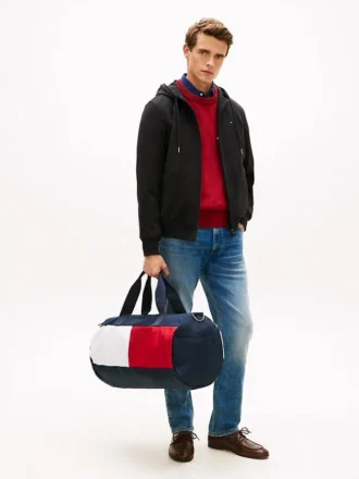 Bolsa de viaje con logotipo de bandera en bloques de color