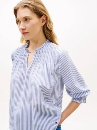 Camisa de gasa con pliegues y ribete de volantes